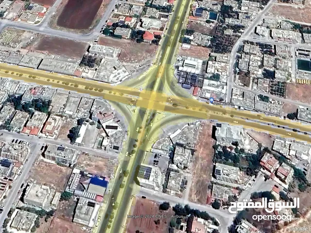 ارض تجاري للبيع - اربد - شارع بغداد الرئيسي - قرب اشارة صالة بردى