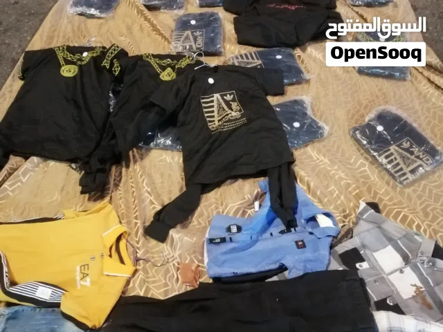 ملابس مشكله نضيفه جدآ تراكات اكو جديد ولا يه من 5 سنوات ال 12 سنه بنطلونات ولادي هواي ابيع شلع