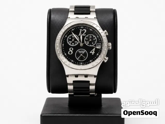 ساعة Swatch تعمل وبحالة جيدة بحجم 39-40، وتأتي معها الحافظة. ممكن تفاوض بسعر