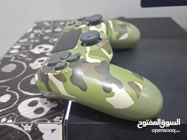سوني بلايستيشن 4 مع كنترولر سليمة 100% و 4 سيديات