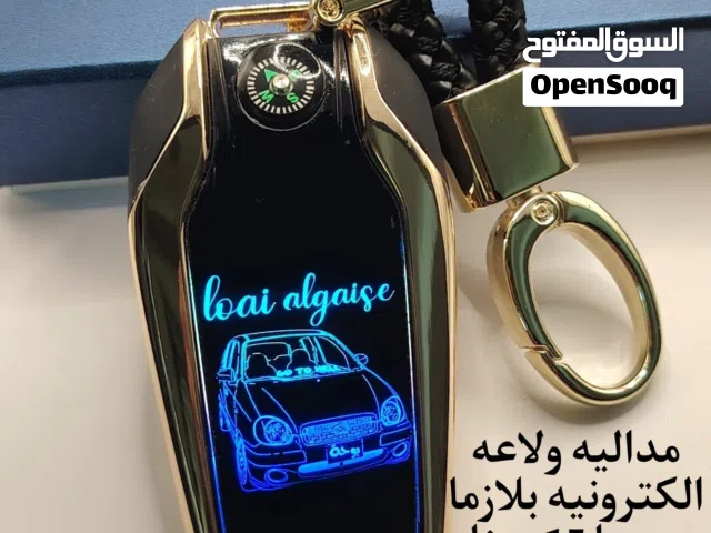 مداليه مع ولاعه الكترونيه/مسبحه/ محفظه/ حافظه مع ولاعه الكترونيه/بكجات.