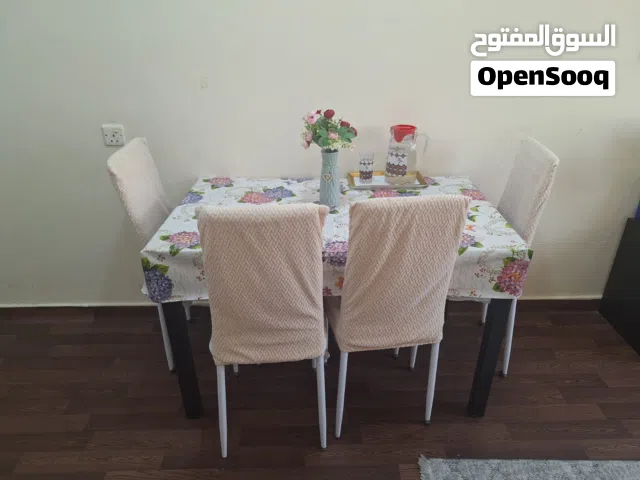 GLASS TABLE WITH 4 CHAIRS