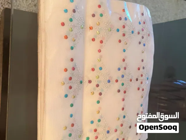 ورق طباعة على الملابس