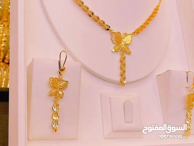 اكسوارات. طلاء ثابت شبيه بالذهب.