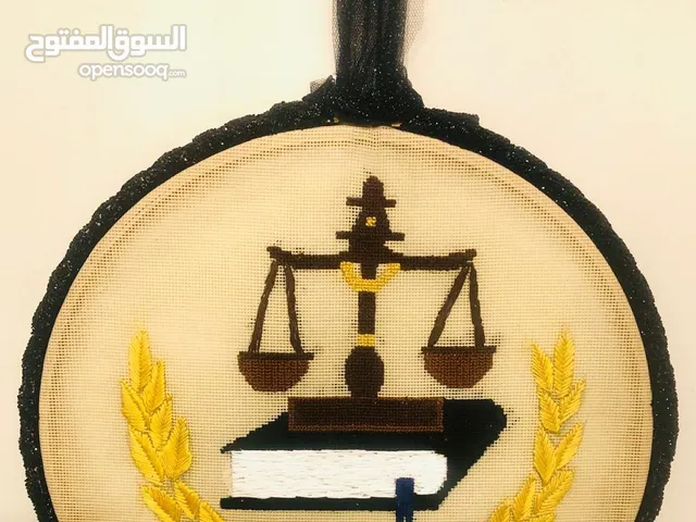 تابلوه لمكتب محاماه تطريز يدوي