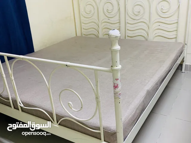 King-size bed with springs mattress very cheap price