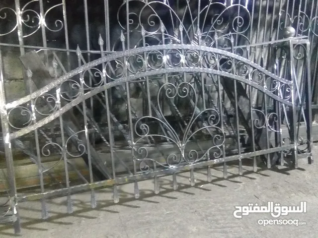 تفصيل تركيب حمايات ابواب شبابيك حداده دربزين ابواب سحاب مصاعد حداد حدادة درج سدد ابواب سحاب باب امان