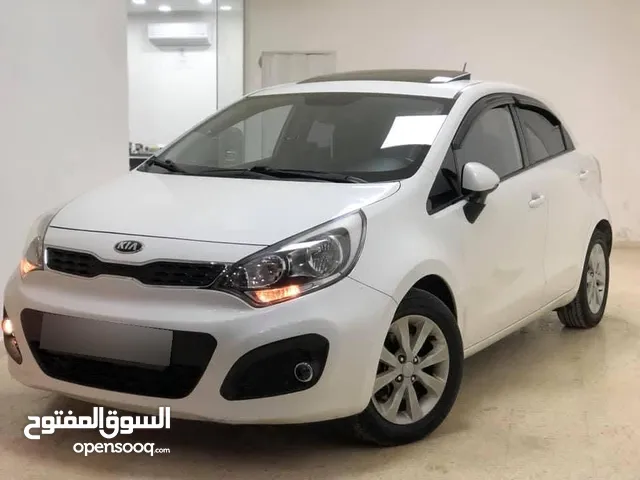 كيا برايد 2013 ترخيص 2013 جير عادي محرك ديزل 1400cc turbo فل اضافات فتحه سقف تحكم