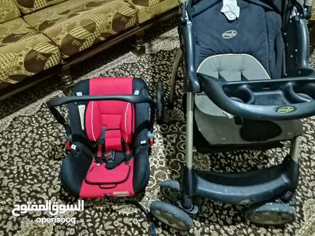 عرباية أطفال Elevenflo + Car seat، عرباية توأم ماركة Juniers