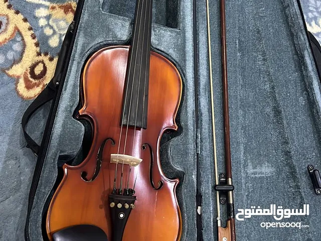 آله موسيقية صينية قديمة حاله جيده مستعمله بشكل خفيف ( للتدريب) الوصف مهم!!
