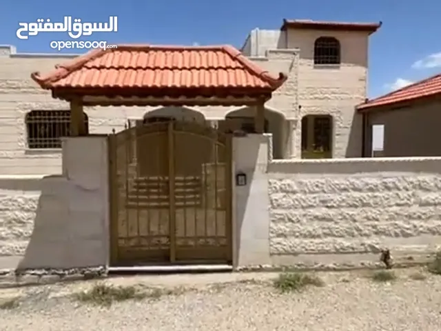 منزل على اربع دنومات بالطفيله