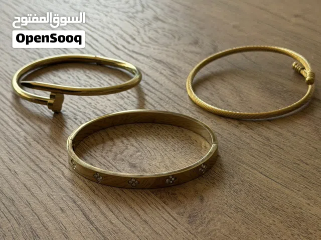 11 Stainless Steel Waterproof Jewelry Pieces (bracelets, ring, and earring) for 120 DHS.