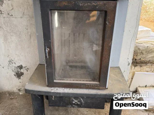 صوبة حطب إيطالية سكب حديد صولد. من الداخل بيت نار طوب حراري إيطالي  شغالة 100٪