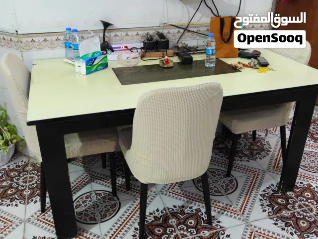 طاولة طعام وستة كراسي (7 قطع)