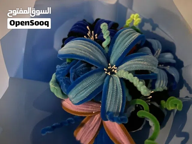 باقه ورد صناعية بالون الازرق الحجم الصغير.