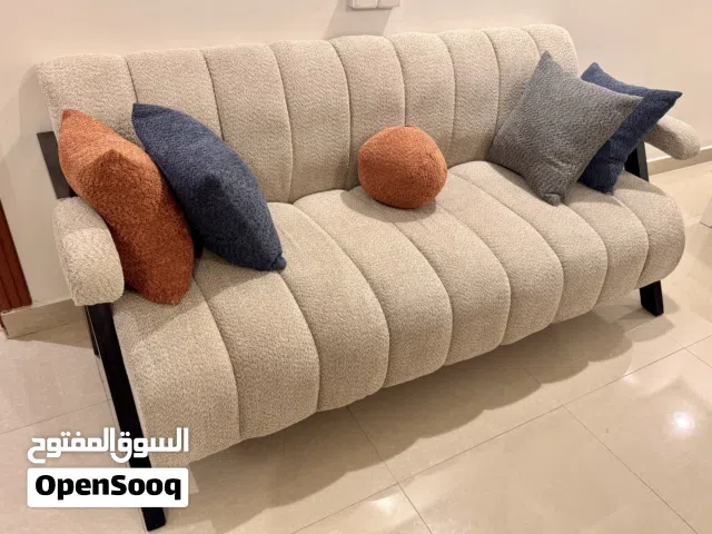 Excellent condition sofa with pillows for sale