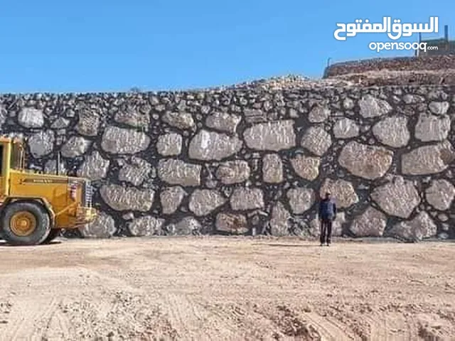 استصلاح الاراضي الزراعيه بناء سناسل حجريه بناء سلاسل تشييك اراضي زراعيه تشييك مزارع بناء الشاليهات