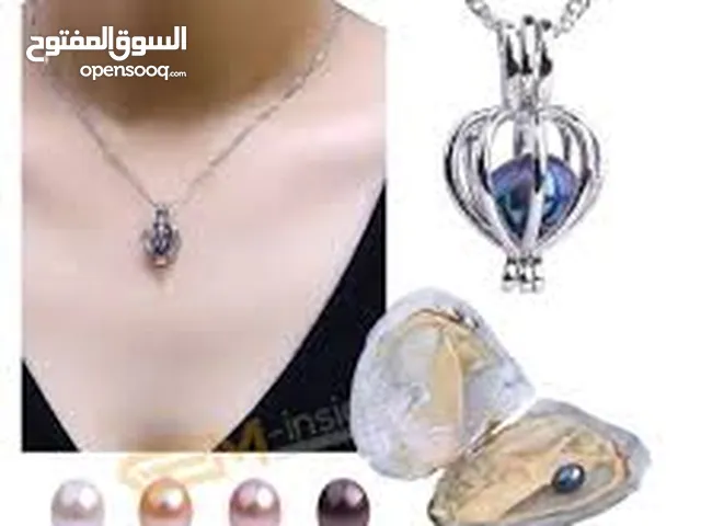 سنسال محارة البحر لاخراج حبة اللولو من داخل علبه بقلب المحاره و تركيبها على السنسال لاحلى هديه