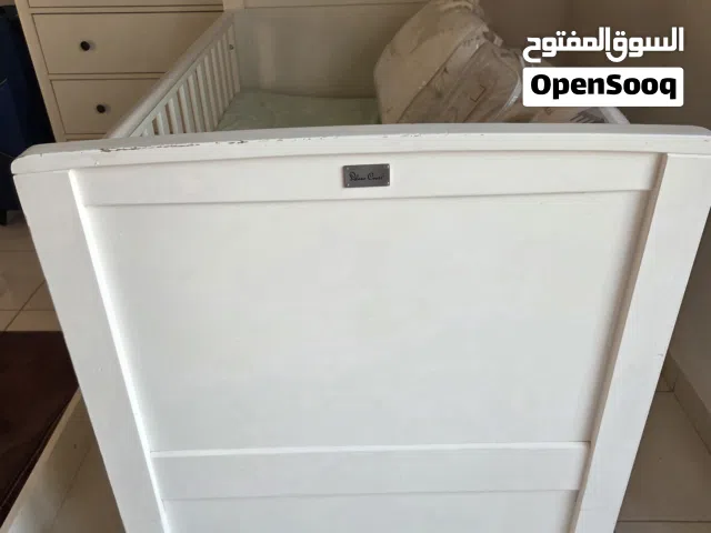 Silver Cross white wooden baby cot.