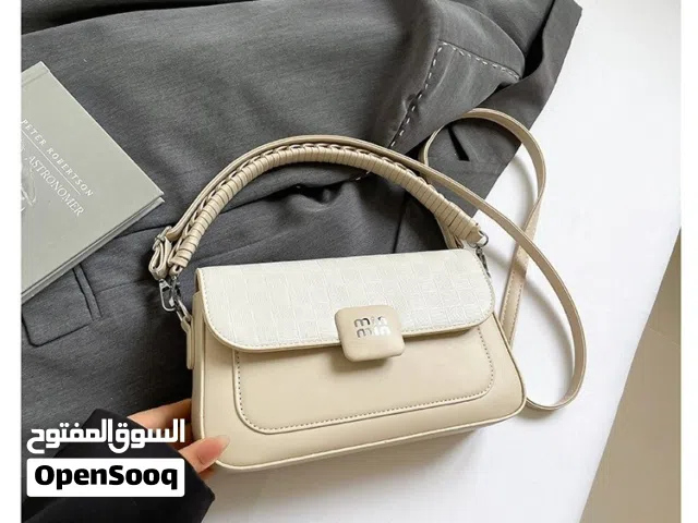 جنطة نسائية جلد متوفرة بثلاثة الوان