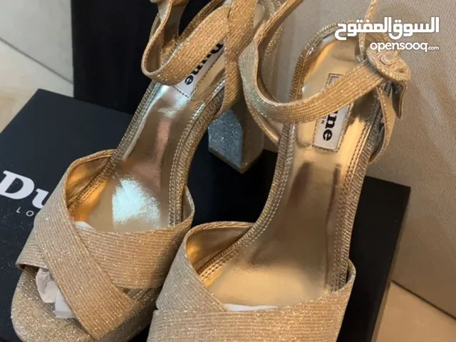 Gold Sandals in Tripoli