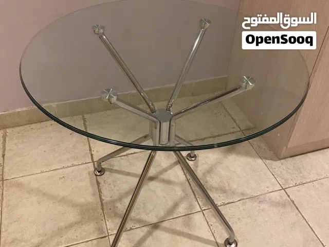 طاولة دائرية زجاج قياس 78سم وارتفاع 75سم شبه جديدة