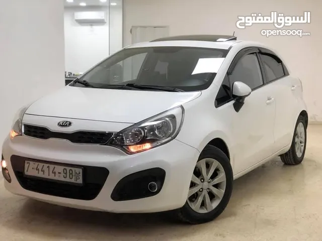كيا برايد 2013 ترخيص 2013 جير عادي محرك ديزل 1400cc turbo فل اضافات فتحه سقف تحكم