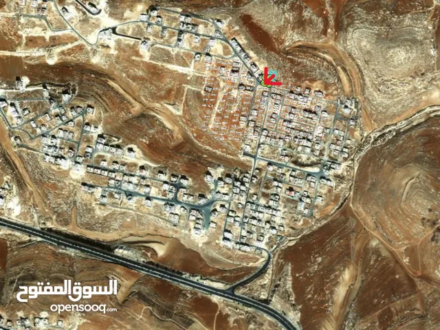 قطعة ارض من اراضي ياجوز شمال عمان للبيع قريبة من شارع الاردن