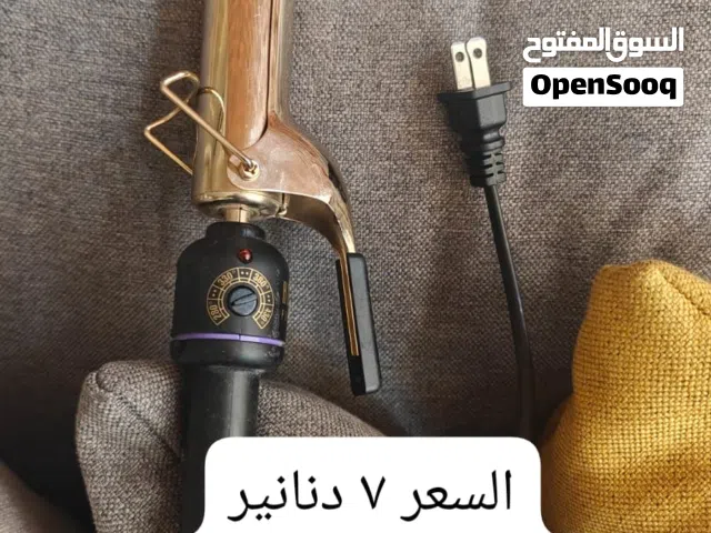 مكواة تجعيد شعر