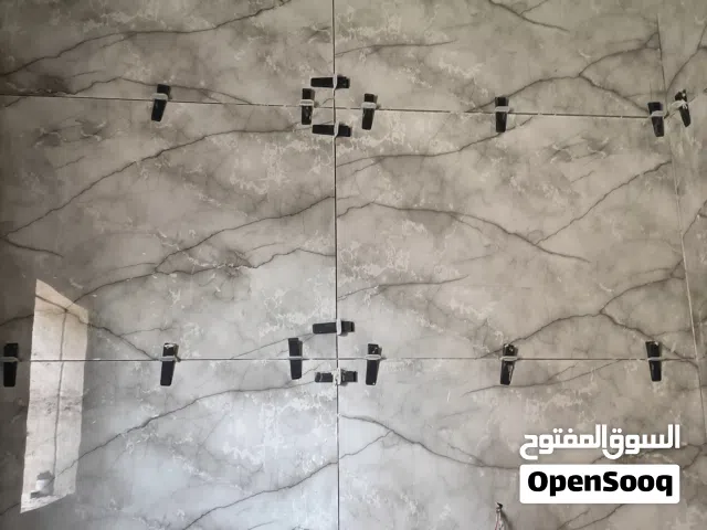 المهندس لتركيب جميع انواع البرسلين والسراميك والزليز والرخام