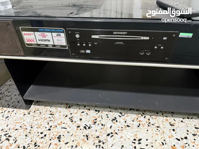 طاولة تيليڤزيون مدمجة بمنظومة هوم سينما Sharp