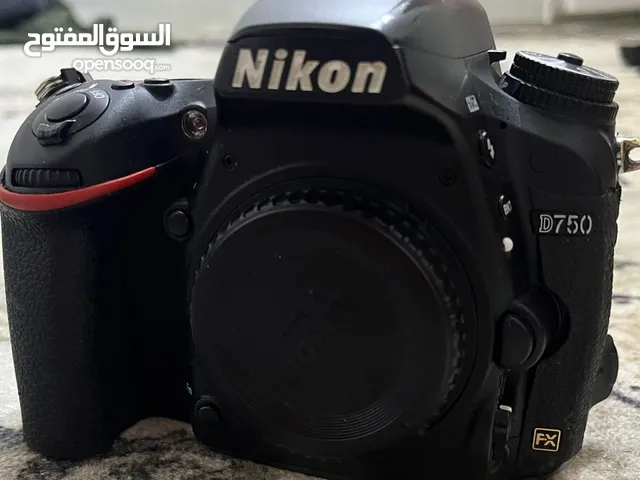 نيكون D750 فول فريم مع عدسة 300-28نانون كرستال