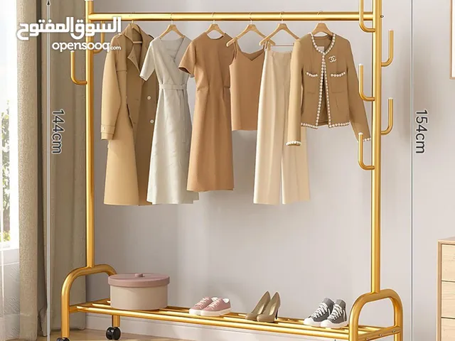 ستاند الملابس والاحذية  الذهبي مصنوع من المعدن القوي ضد الصدأ  يتسع لكمية كبيرة جدا من الملابس