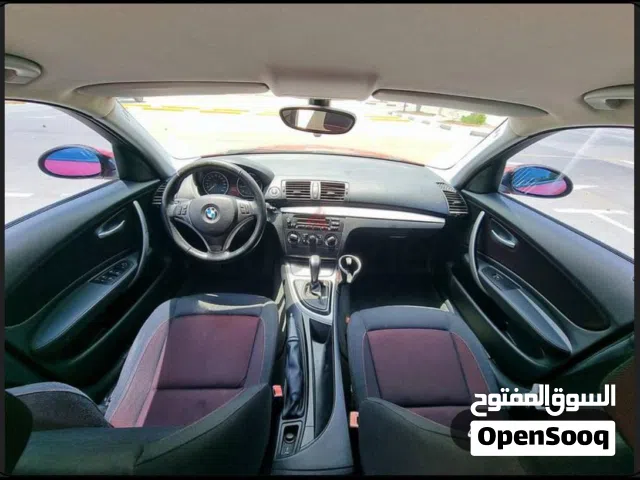 BMW 118i model 2009 180000 KM raning red color good condition
