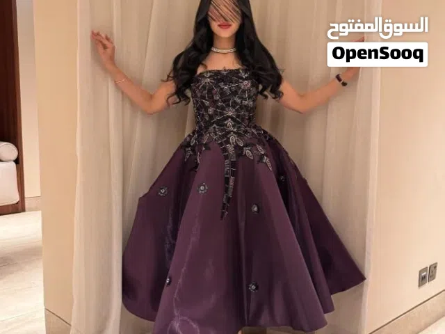 فستان بنفسج غامق من السعوديه