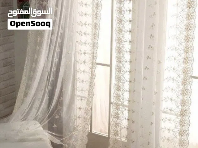 أقمشة وستائر الدانتيل الفاخر بتصاميم أنيقة وعصرية لعام 2026 لمسة راقية لمنزلك وتفصيل حسب الطلب
