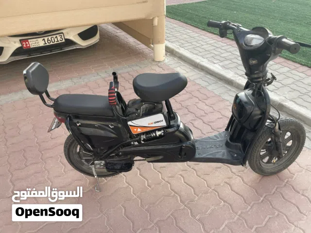 سكوتر راكبين