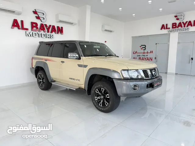 نيسان باترول سوبر سفاري قير أتوماتك بيج رمادي / زعفراني خليجي
