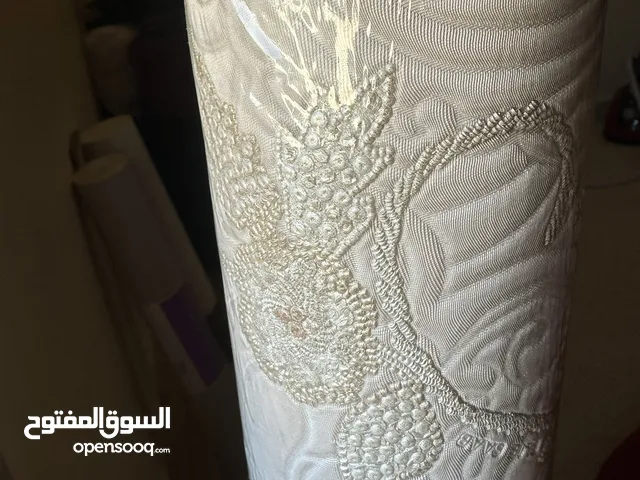 ورق جدران مطرز جلد مميز من تصميم ايلي صعب اخر الكمية ولن يتم التجديد