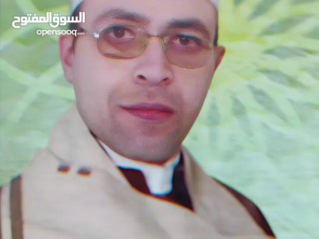 محفظ للقرآن الكريم بالتجويد وبعلم المقامات الصوتية لقراءة القرآن الكريم