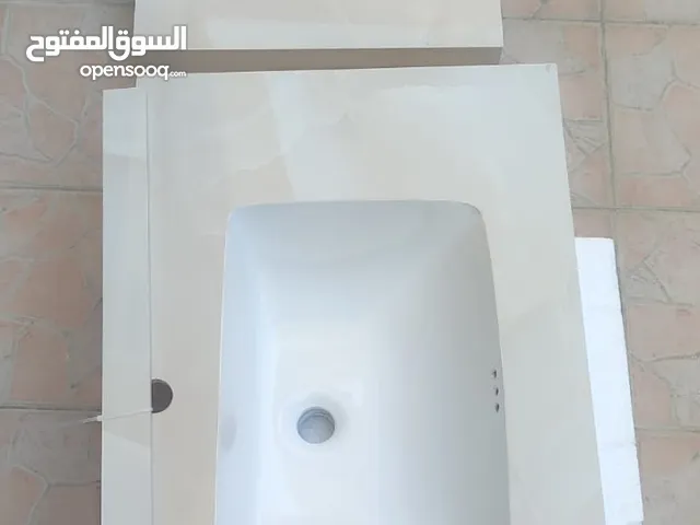 للبيع مغسلة مع رف بورسلين جديد For sale porcelain wash basin and shilf o