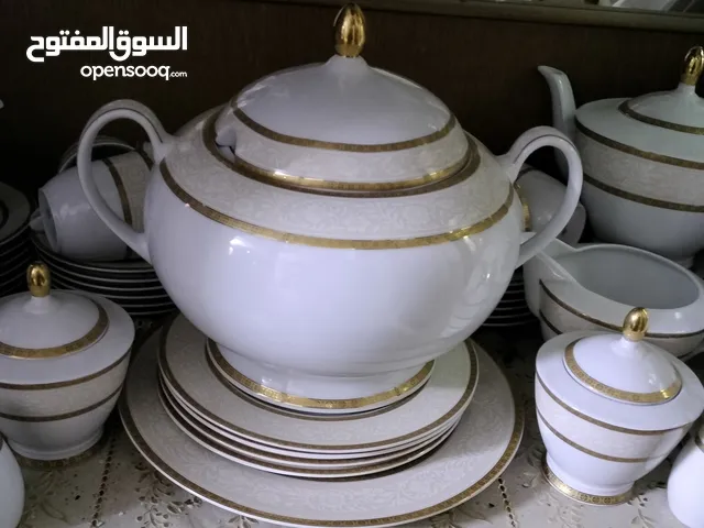 طقم صيني مدهب اماراتي ماركة سكالبتشر مستورد 74قطعه