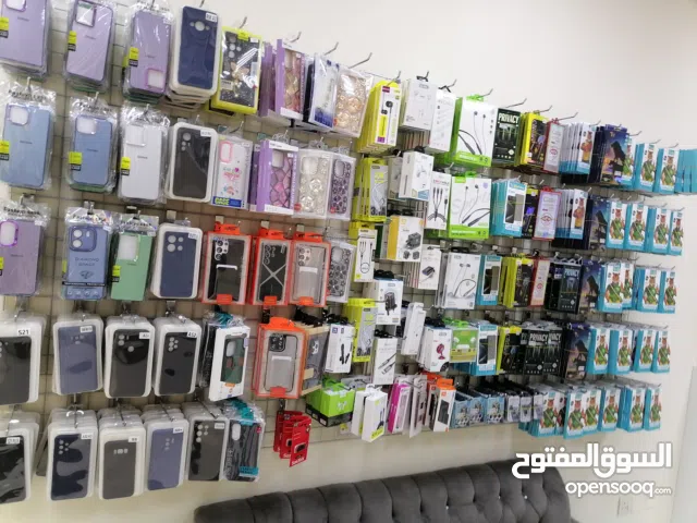 محل بيع هواتف متنقلة وحاسب آلي