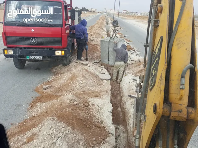 سائق جي سي بي في عمان