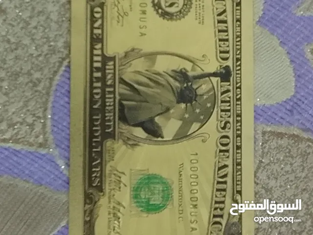 ورقة مليون دولار بي2000 دينار