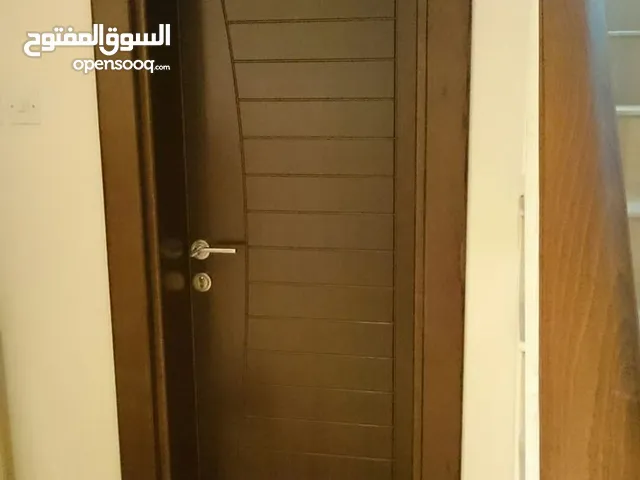 أبواب خشبية زان مقنو ميرندي سويدي غرف نوم دواليب طاولات ماسات كراسي ديكورات مكاتب مجالس عربية شبابيك