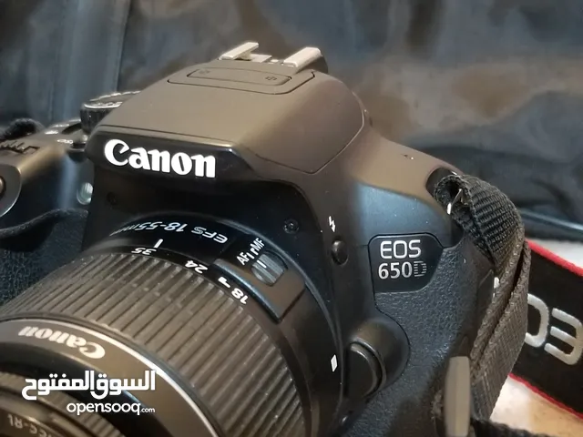 كاميرا كانون d650 مع عدسه 50 و استاند تصوير و شنطه