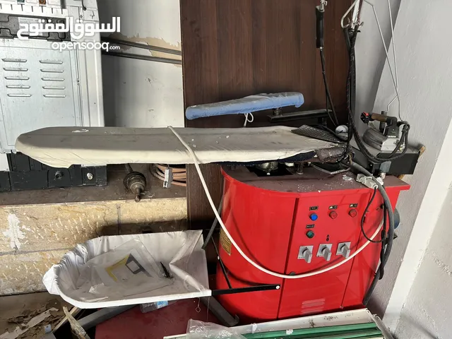 ماكينة كوي ملابس 3 فاز نفخ وشفط بحاله ممتازه واستخدام بسيط