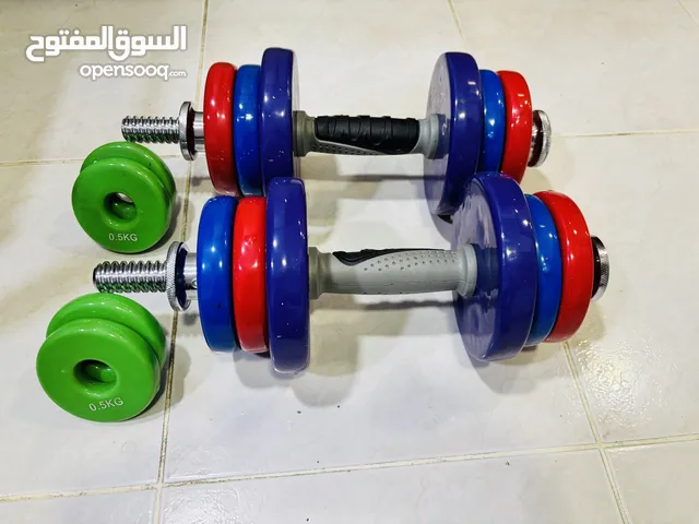 حديد أثقال وطاوله للبيع.