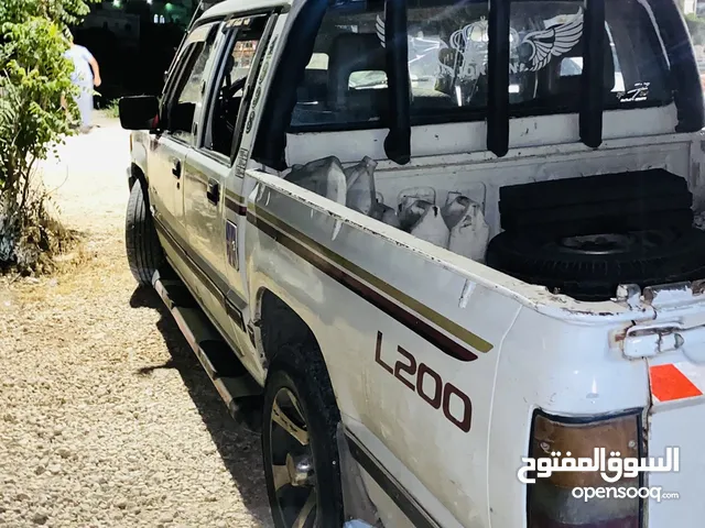مستبيشي 1998 L200 لون ابيض للبيع اقساط دفعه 1000بحاجت ترخيص منتهي 6اشهر للستفسار